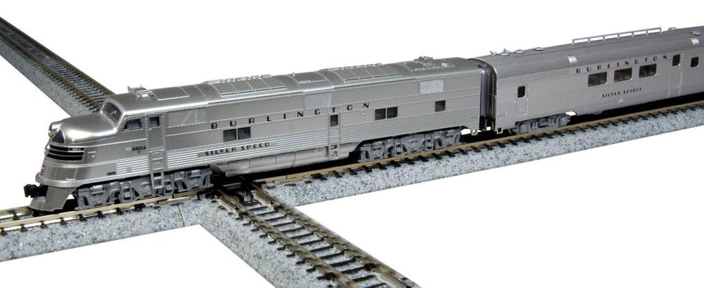 A point of interest is that all E5 s were custom built with stainless steel corrugated sides so as to match the CB&Q s stainless cars; a feature that gives these locomotives a noticeable shine and