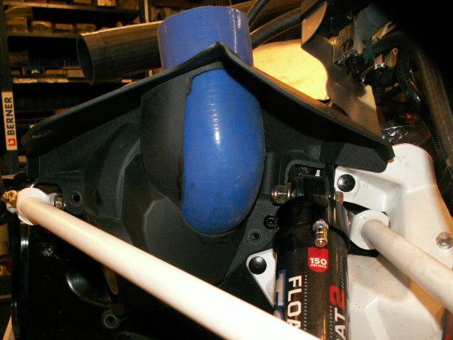 Install a new gasket between the stock exhaust tube and the MCX exhaust tube.