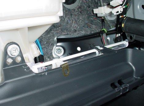 Install passenger side light guide. i. Locate tabs indicated as shown. 6.