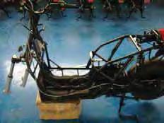 Move the brake hose including the complete brake lever assembly through the