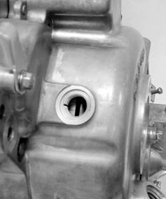 generator flywheel to the top dead center (TDC) on the compression stroke so that the T mark on the flywheel aligns