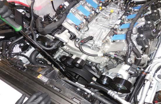 Apply a thin layer of Lubriplate grease to the outside of the transmission cooler line prior to installing it in its original