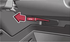 Raise the lid and press it until the catch is heard to engage. In the storage compartment are pin holders. The storage compartment must always be closed when driving for safety reasons.