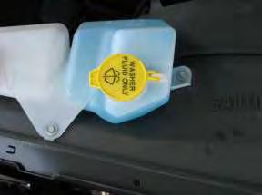 k. Loosen and remove washer bottle / overflow