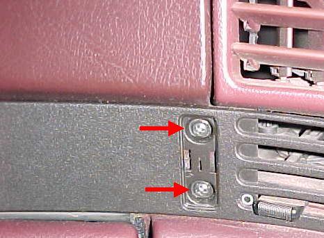 Behind the trim cover you will find two (2) Phillips head screws which must be