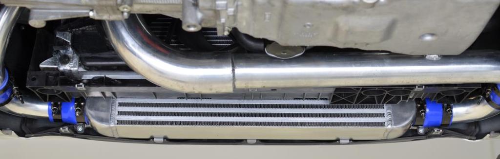 Figure 6a b) Install the CS cold pipe. Remove the lower passenger side A/C bolt using a 12mm wrench. Insert the 3.