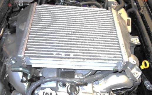 the intercooler from the vehicle by pulling