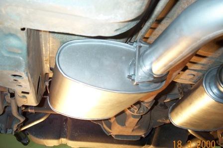 NOTE: The mufflers are reversible. 4) To install the left tail pipe, you will first need to remove the O.E. hanger